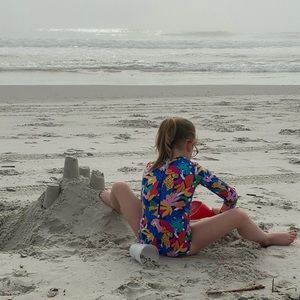 ISO Jungle Roar Mott50 one piece rash guard sz 10 girls